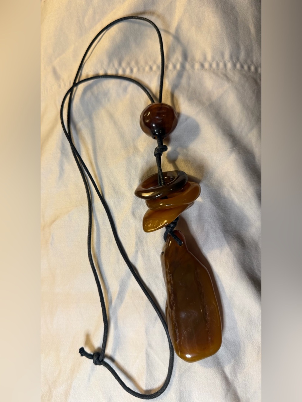 Vintage Brown Amber-Style Pendant Necklace with Black Cord - Unbranded
